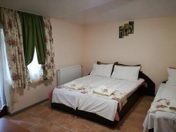 Фото номера Семейный номер с видом на сад Гостевой дом Guest House Gebran г. Свиленград 6